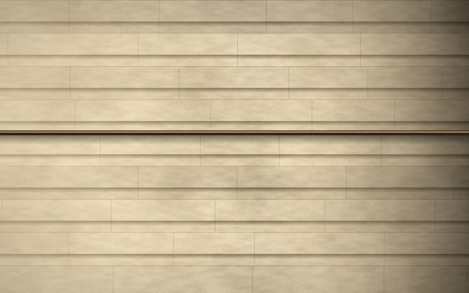 Hand-set limestone in raking light